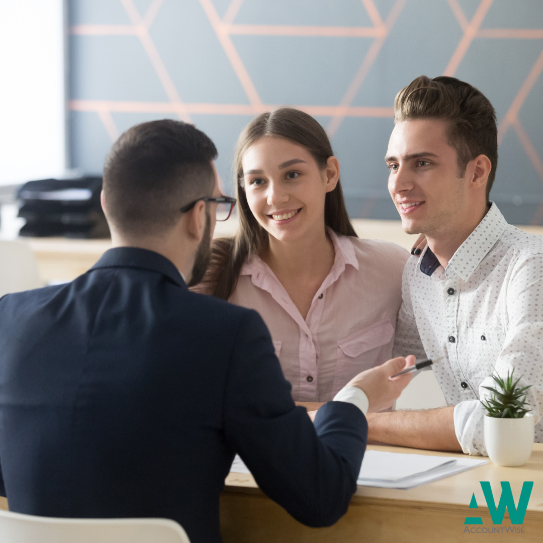 A family discussing a loan from a personal company to a family member